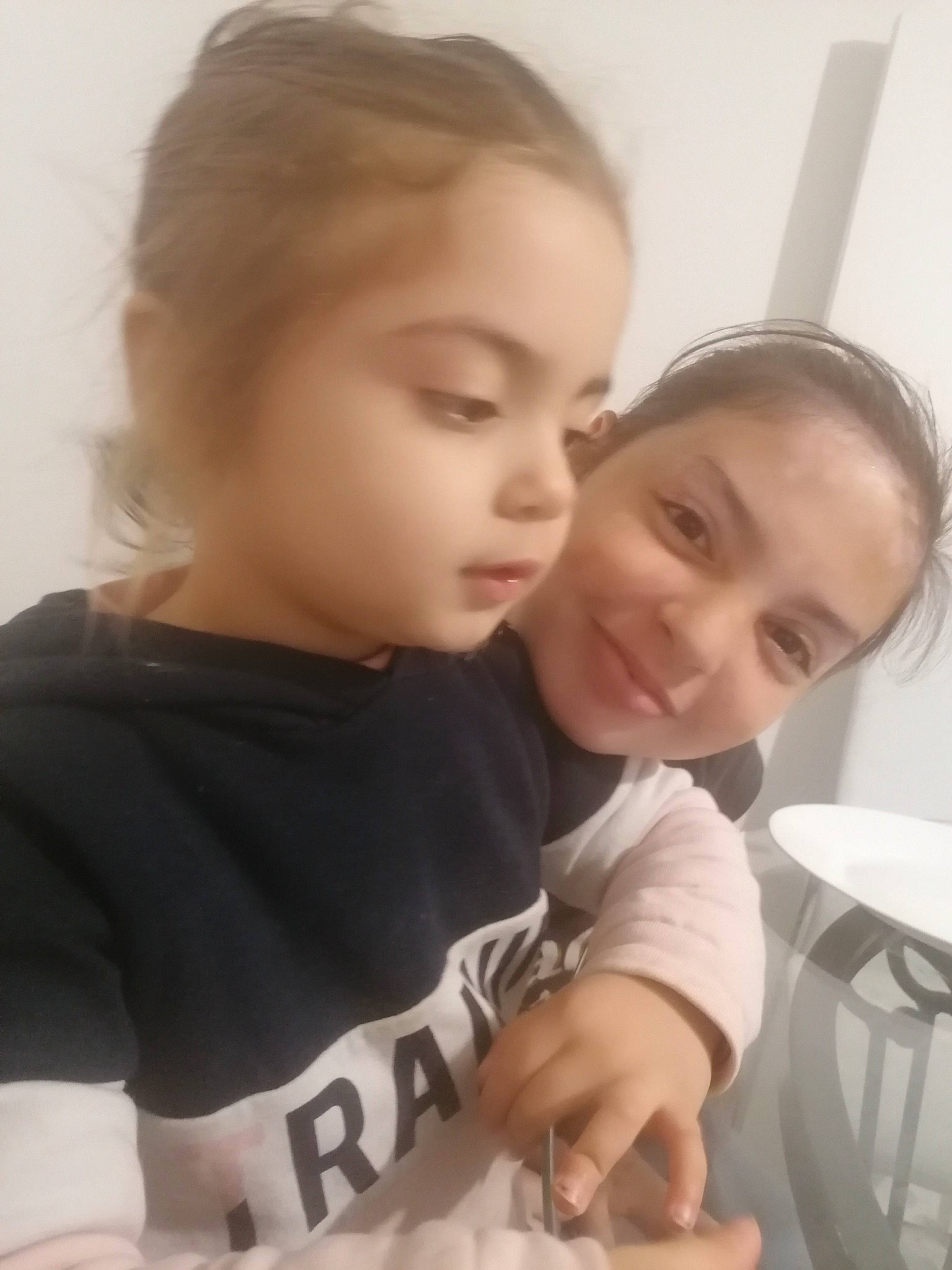 Maryam participe au concours pour gagner de l'argent avec cette photo : baby, baby_toddler_clothing, brown_hair, cheek, child, comfort, ear, eyebrow, eyelash, hair, head, joy, long_sleeved_t_shirt, love, nose, person, shoulder, sleeve, toddler