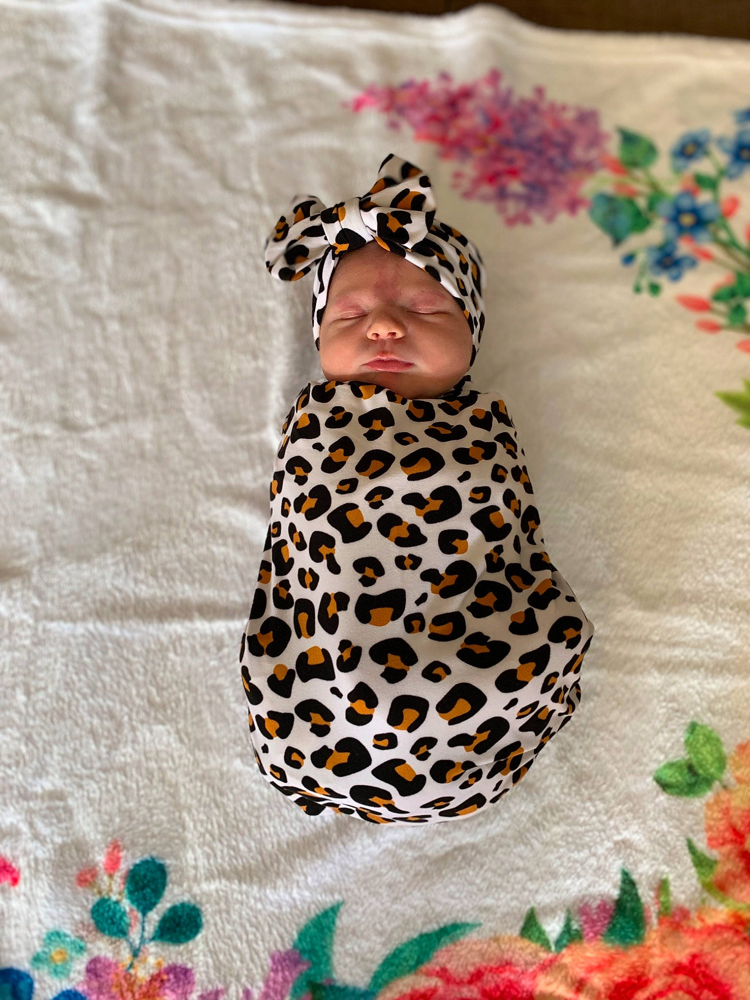 Oakley is registered to the contest to win money with this photo: art, baby, baby_products, baby_toddler_clothing, dress, fashion_accessory, fawn, hair_accessory, headband, headpiece, insect, linens, needlework, pattern, peach, person, sleeve, textile, toddler, tree