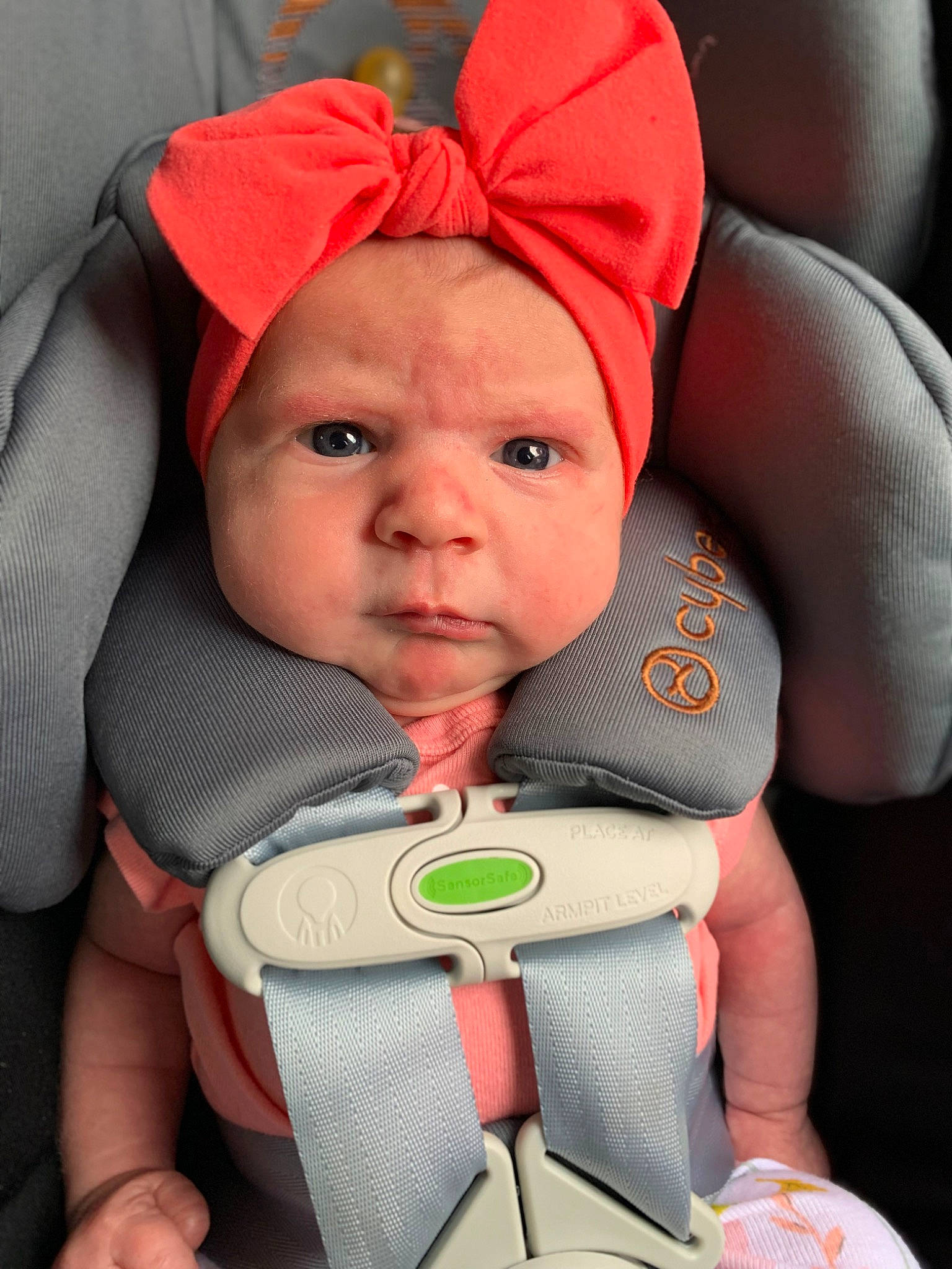 Oakley joined the competition — help win amazing prizes! baby, baby_carriage, baby_in_car_seat, baby_products, baby_safety, baby_toddler_clothing, car_seat, carmine, cheek, child, comfort, facial_expression, finger, happy, headwear, human, lap, mouth, person, seat_belt