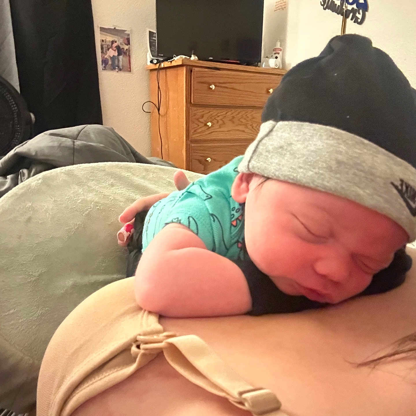 Micheal is registered to the contest to win money with this photo: baby, cap, childbirth, clothing, computerhardware, cushion, electronics, face, furniture, hardware, hat, head, homedecor, monitor, newborn, person, photography, portrait, screen, sleeping