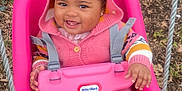 Tey is registered to the contest to win money with this photo: baby, clothing, coat, face, grass, hat, head, hosiery, jacket, nature, outdoorplayarea, outdoors, park, person, photography, plant, playarea, portrait, swing, toy