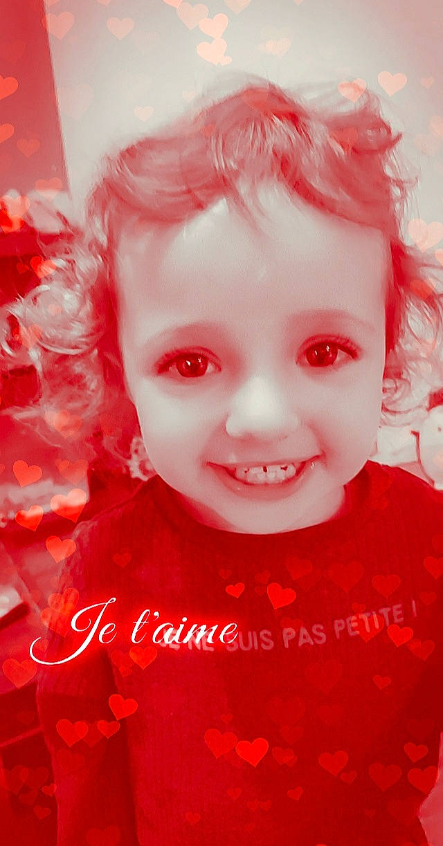 Selena participe au concours pour gagner de l'argent avec cette photo : art, cheek, child, face, facial_expression, head, joy, lip, mouth, nose, person, red, smile