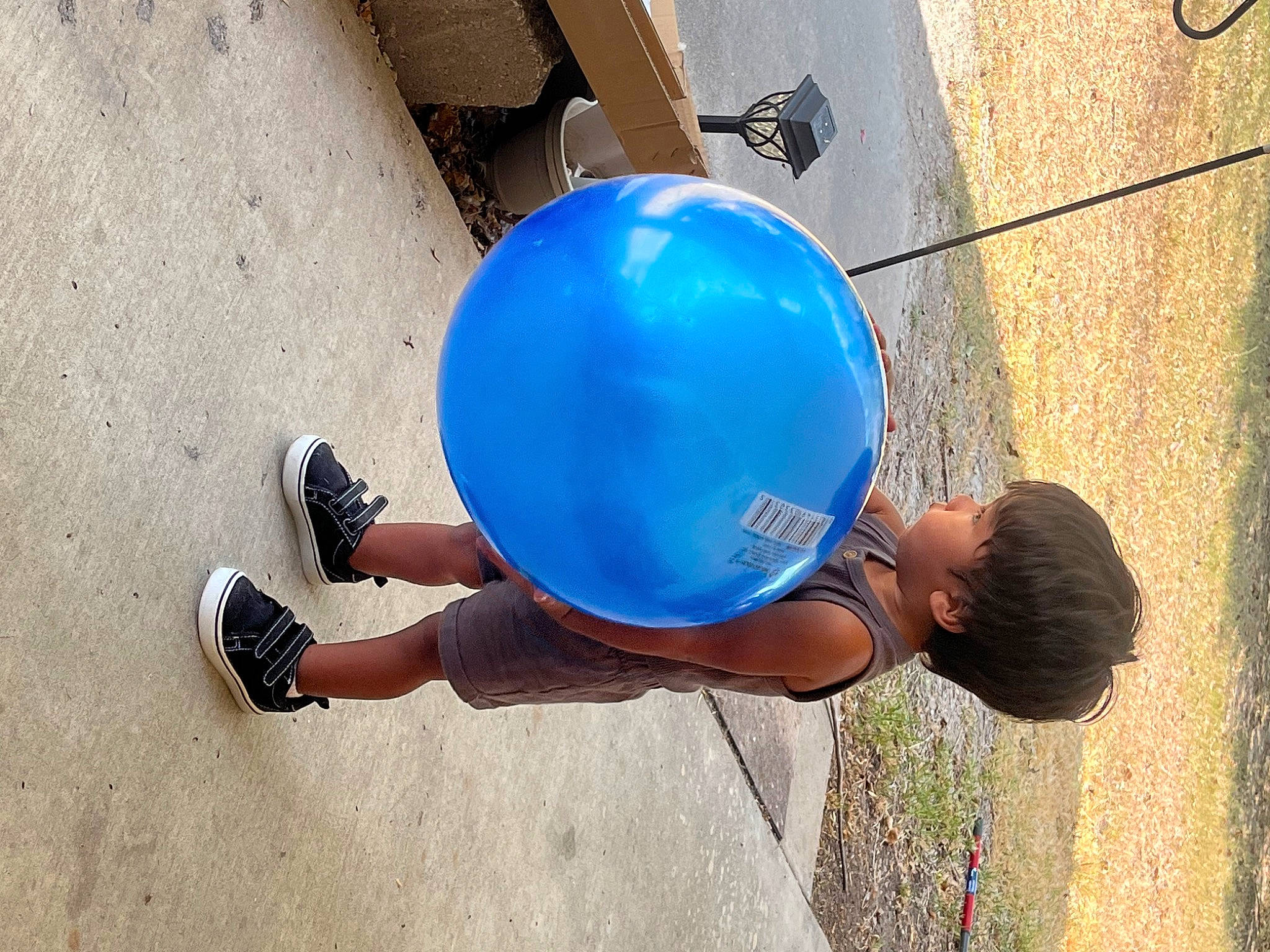 Hendrix joined the competition — help win amazing prizes! azure, balance, ball, balloon, child, concrete, electric_blue, fun, human_leg, leisure, paint, party_supply, person, physical_fitness, play, recreation, sphere, t_shirt, toddler, world