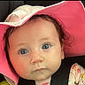 Audriana joined the competition — help win amazing prizes! baby, child, face, blue_eyes, pink_hat, floral_clothing, car_seat, seatbelt, closeup, portrait, infant, cute, young_child, indoor, person, headwear, expression, curious, skin, baby_girl