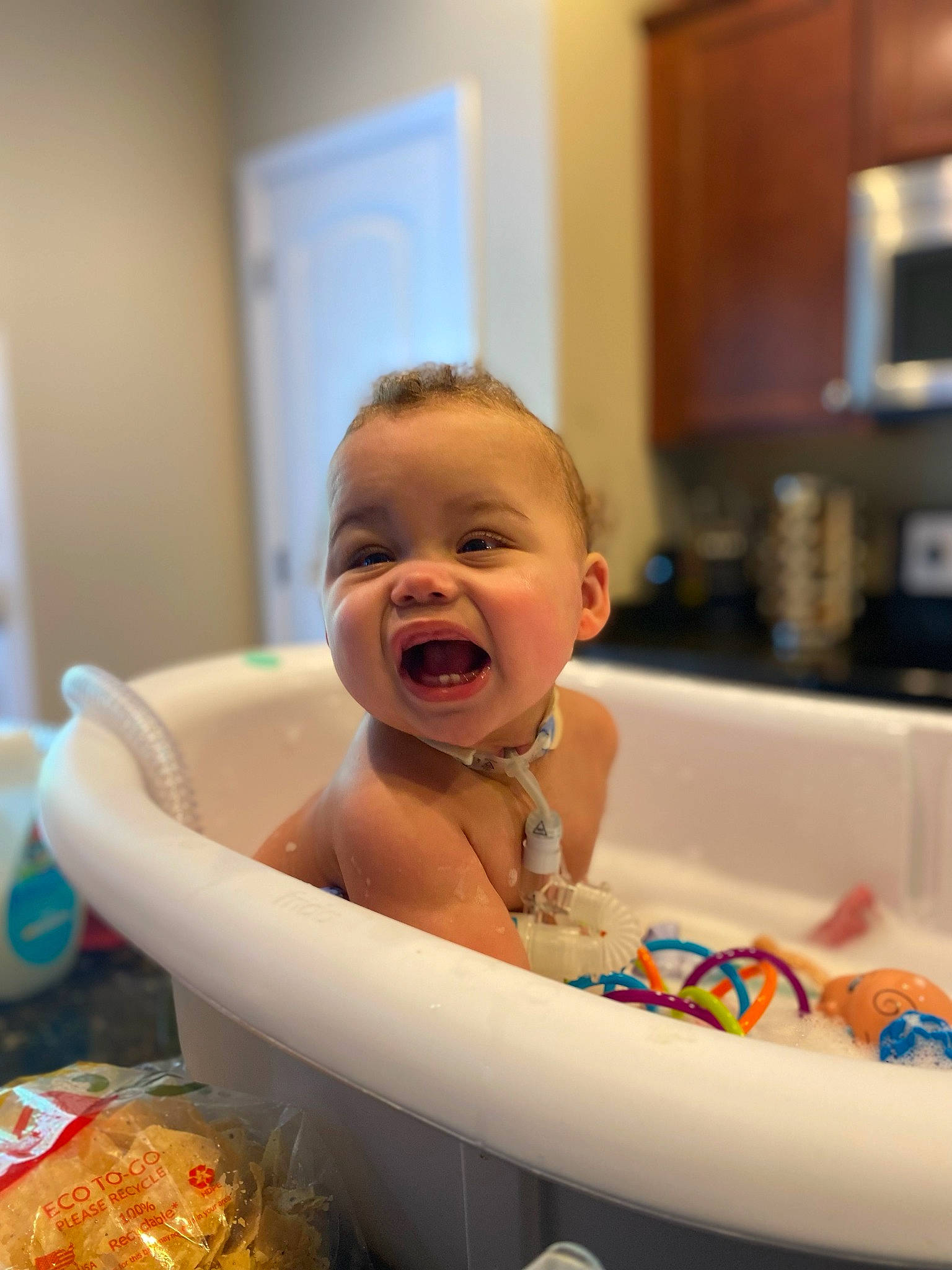 Paris joined the competition — help win amazing prizes! baby, baby_bathing, baby_laughing, baby_products, bathing, bathroom, bathtub, cheek, child, fun, happy, kitchen_appliance, laugh, leisure, mouth, person, plumbing, plumbing_fixture, room, smile