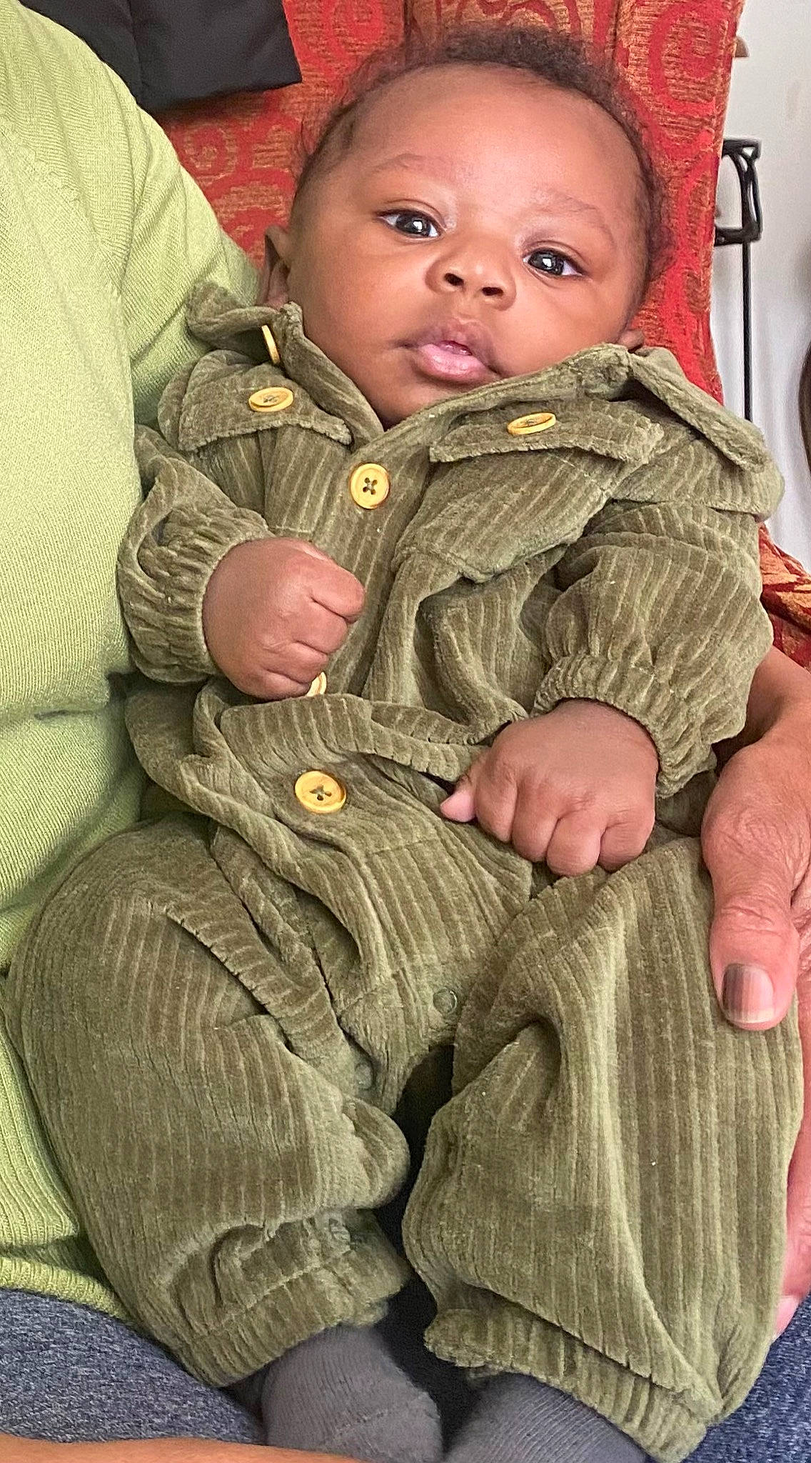 Rhyel is registered to the contest to win money with this photo: baby, baby_toddler_clothing, cheek, chin, comfort, eye, face, facial_expression, finger, gesture, happy, head, human_body, jacket, nose, person, skin, sleeve, thumb, toddler