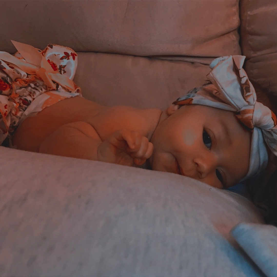 Athena joined the competition — help win amazing prizes! baby, babylaughing, bed, blanket, bonnet, clothing, couch, cushion, diaper, face, furniture, happy, hat, head, homedecor, newborn, person, sleeping, smile