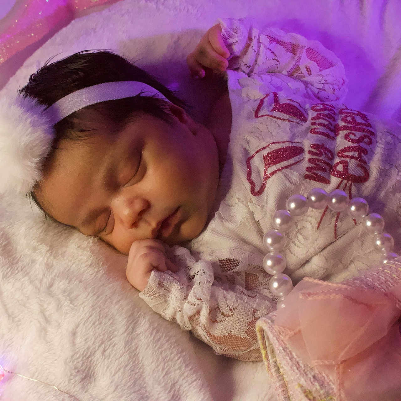 Naylee joined the competition — help win amazing prizes! accessories, baby, bed, bedroom, blanket, bodypart, face, finger, furniture, hand, head, jewelry, necklace, newborn, pearl, person, photography, portrait, purple, sleeping