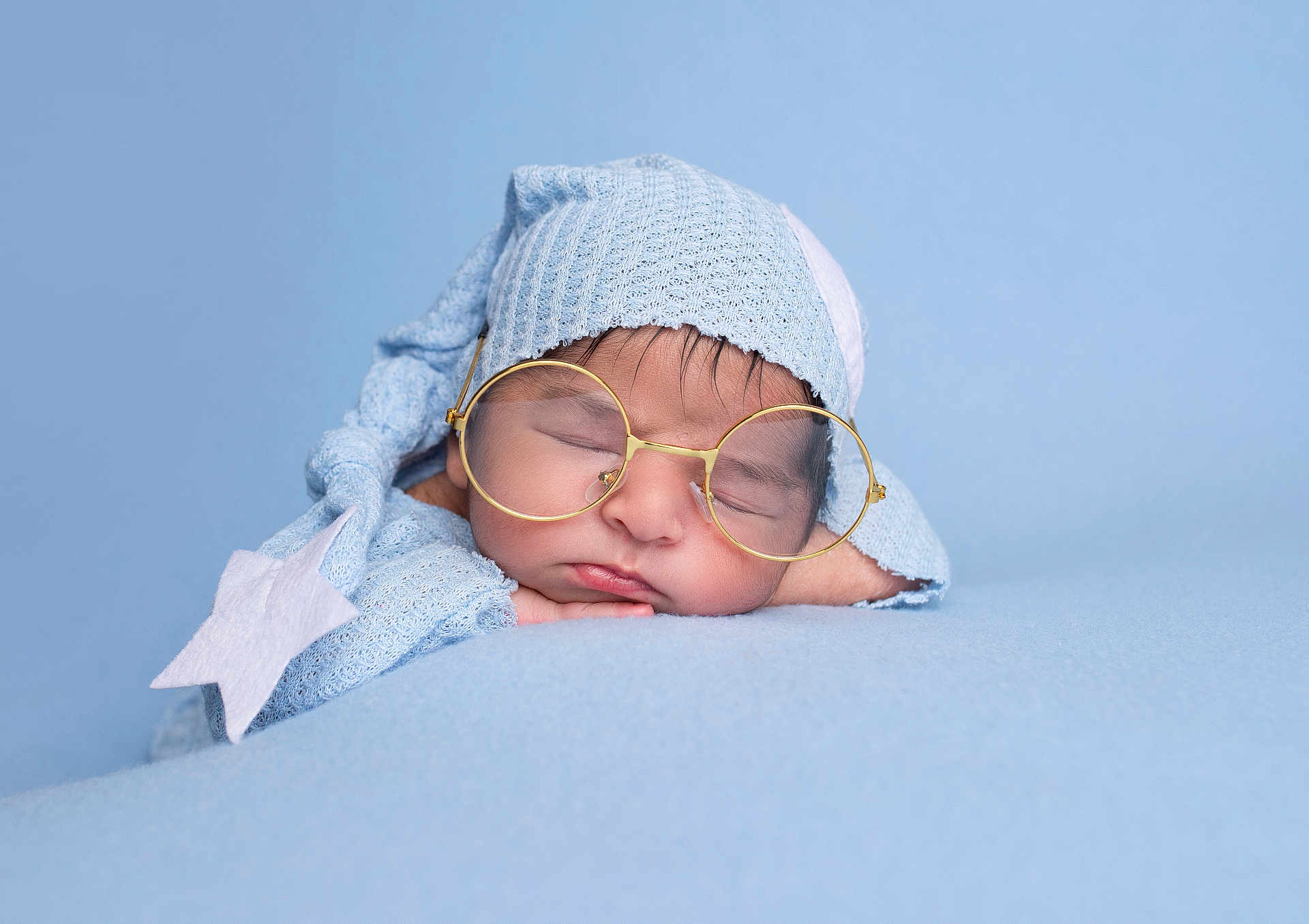 Pavish joined the competition — help win amazing prizes! baby, sleeping, glasses, blue, hat, knit, star, soft, blanket, closeup, face, cute, peaceful, infant, portrait, child, resting, cozy, newborn, headwear