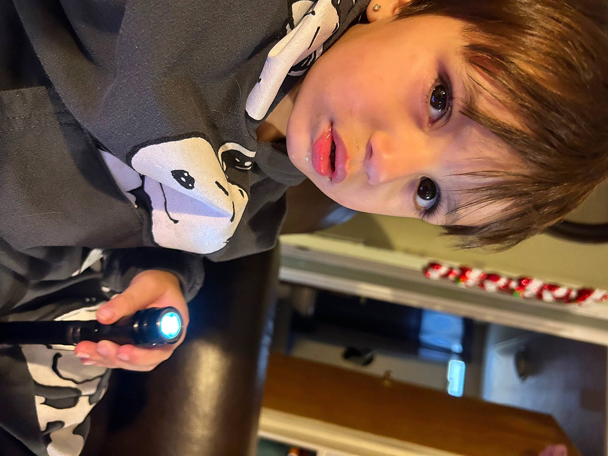 Amari is registered to the contest to win money with this photo: bottle, brown_hair, cheek, child, eye, eyebrow, eyelash, eyewear, face, flash_photography, fun, hair_coloring, lip, lipstick, machine, nail, person, portrait_photography, skin, toy