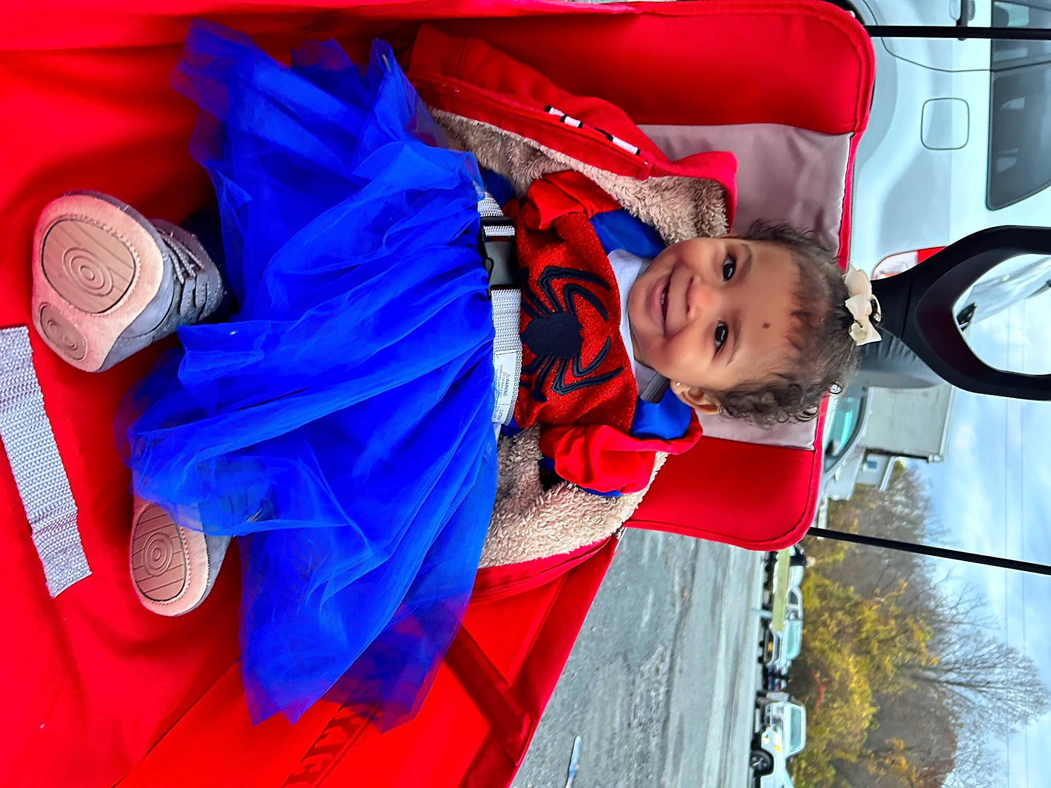 Paisley joined the competition — help win amazing prizes! automotive_lighting, automotive_tire, automotive_wheel_system, baby, carmine, child, electric_blue, family_car, fun, happy, hat, joy, motor_vehicle, person, recreation, red, smile, tire, toddler, travel