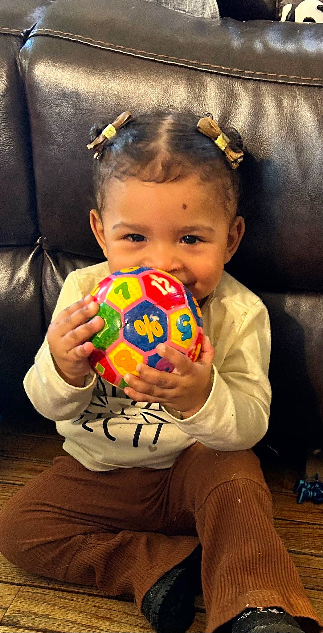Paisley joined the competition — help win amazing prizes! baby_toddler_clothing, cheek, child, cool, event, eye, facial_expression, flash_photography, fun, happy, head, holiday, leisure, person, play, sitting, smile, soccer_ball, sweetness, t_shirt