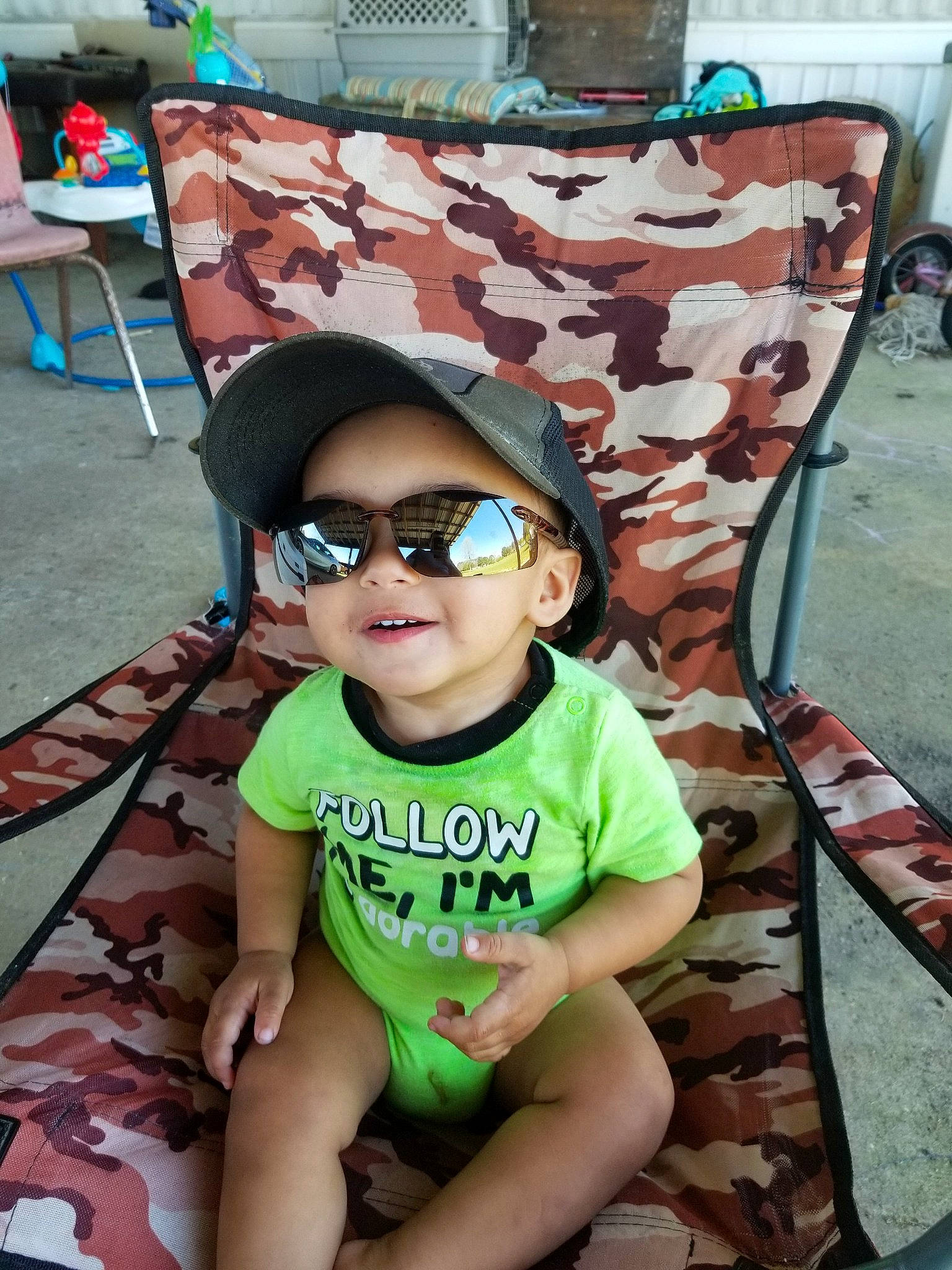 Kylar joined the competition — help win amazing prizes! baby, baby_toddler_clothing, cool, eyewear, fashion, glasses, goggles, green, happy, hat, headwear, leisure, person, product, sandal, shoe, smile, sun_hat, sunglasses, thigh