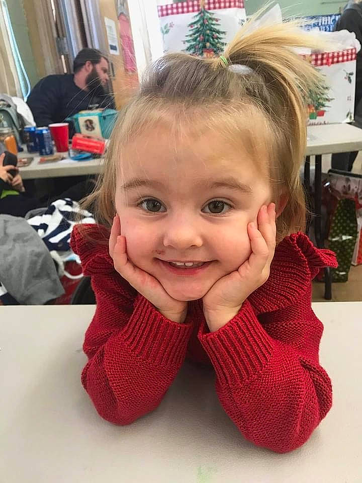 Klara is registered to the contest to win money with this photo: baby, baby_toddler_clothing, blond, cheek, child, hair_accessory, hairstyle, head, joy, person, sweater, toddler, tooth, wool, woolen