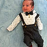 Dominic joined the competition — help win amazing prizes! baby, black_pants, blue_blanket, bow_tie, child, cozy, cute, fashion, hair_spikes, happy, indoors, infant, lying_down, person, portrait, red_socks, smiling, suspenders, white_sweater, young