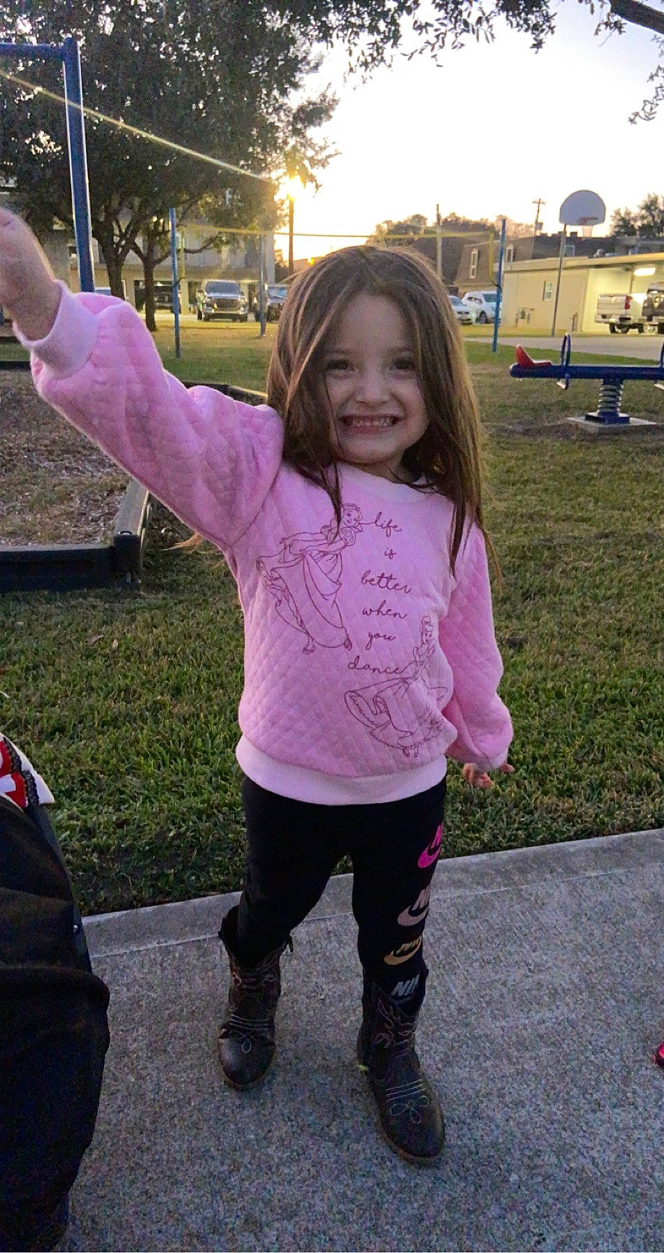 Meredith joined the competition — help win amazing prizes! active_pants, boot, human_settlement, joy, leggings, outdoor_play_equipment, person, pink, playground, public_space, purple, swing, tights, violet