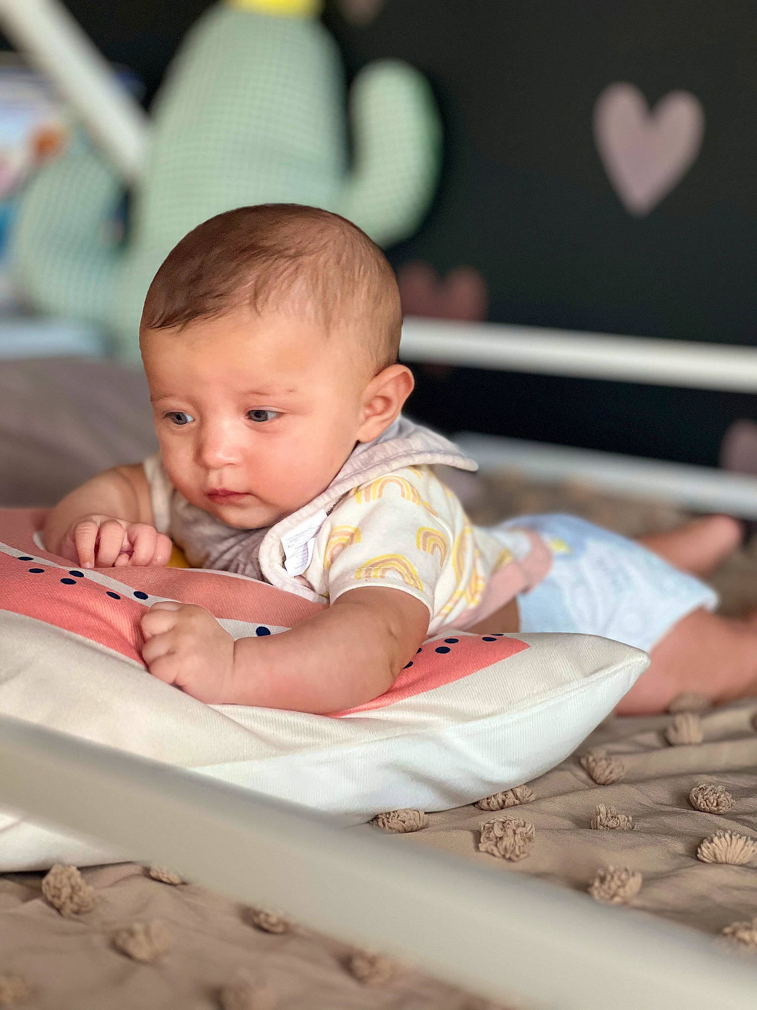 Amelia is registered to the contest to win money with this photo: baby, baby_toddler_clothing, bib, cheek, child, comfort, flash_photography, flooring, fun, happy, leisure, person, portrait_photography, room, sitting, skin, toddler, vacation, wood