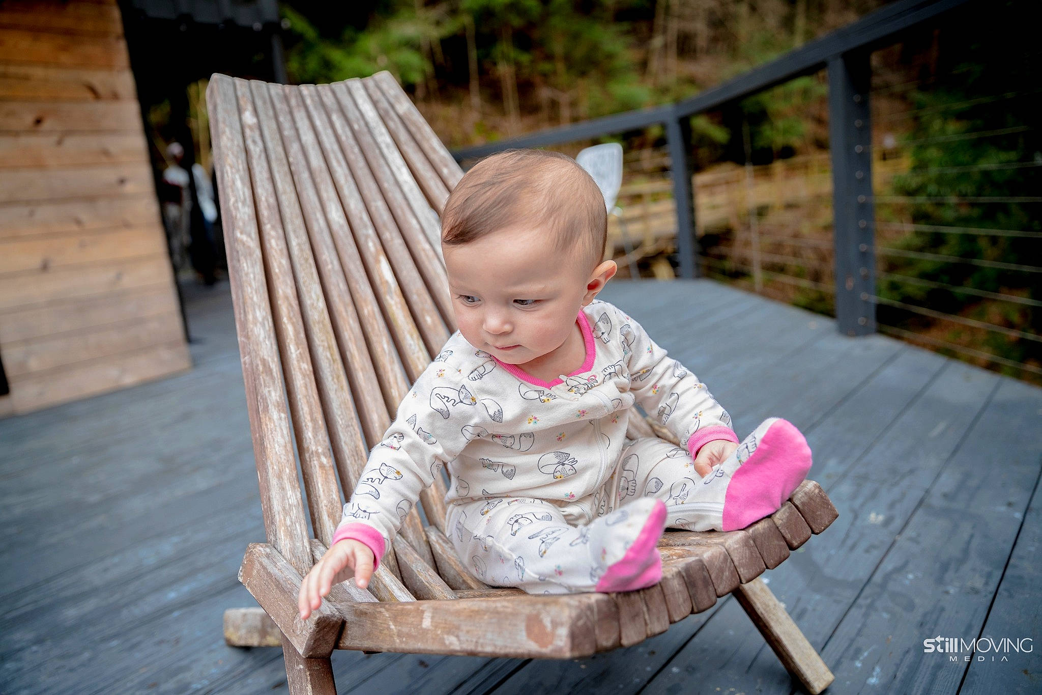 Amelia is registered to the contest to win money with this photo: baby, baby_products, baby_toddler_clothing, chair, child, dress, face, fence, fun, grass, happy, leisure, people_in_nature, person, plant, recreation, sitting, skin, toddler, tree