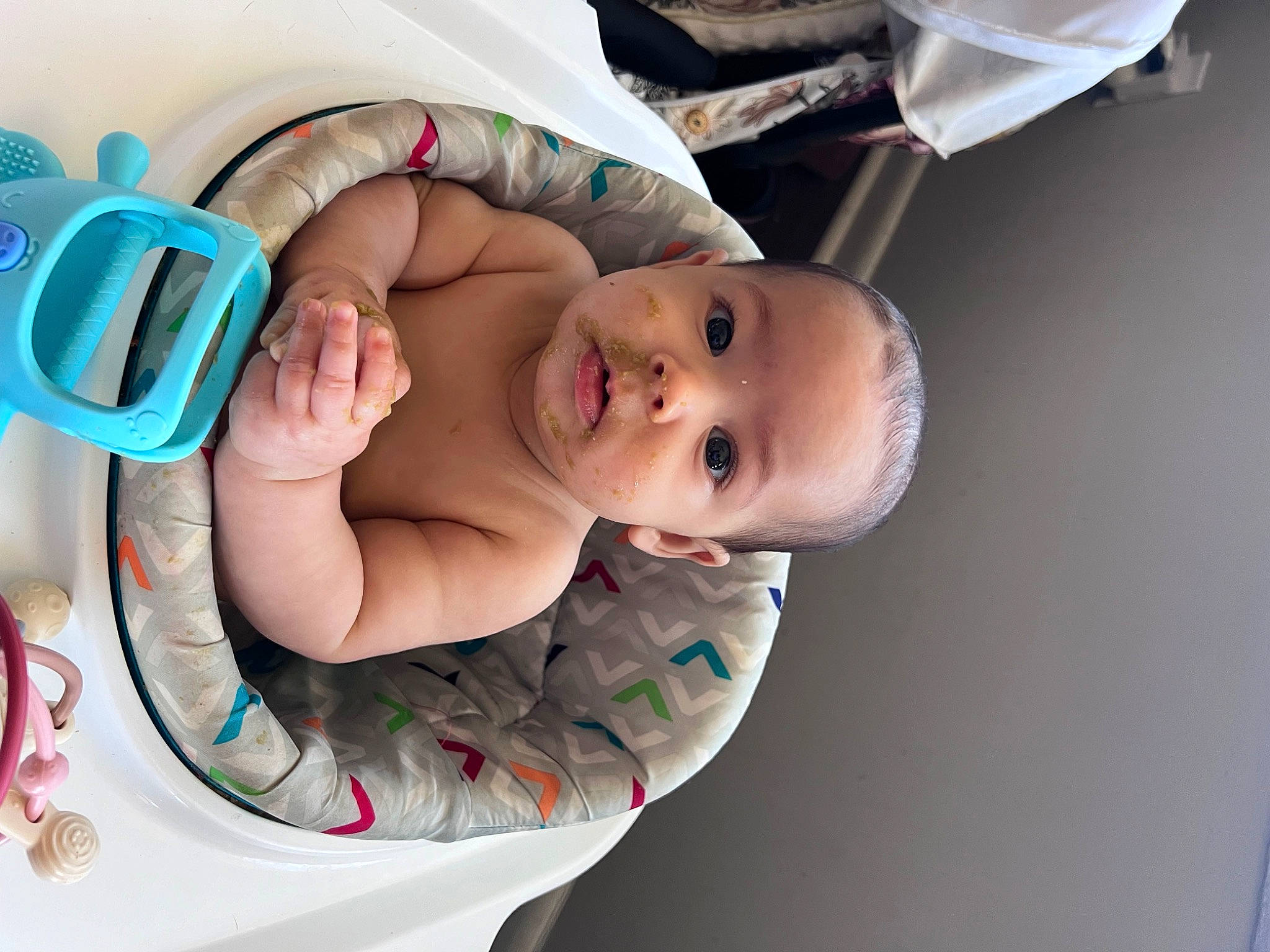 Violet is registered to the contest to win money with this photo: baby, baby_products, baby_sleeping, baby_toddler_clothing, cheek, child, comfort, eyelash, fashion_accessory, happy, headgear, linens, pattern, person, personal_protective_equipment, portrait_photography, sitting, skin, toddler