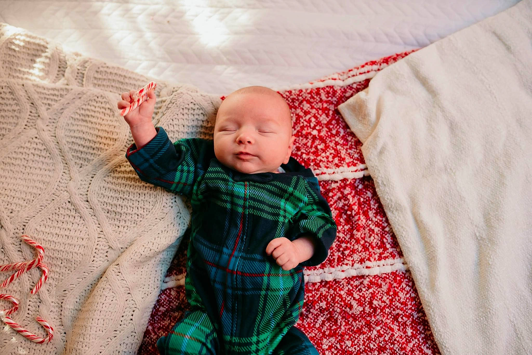 Kaysen joined the competition — help win amazing prizes! baby, baby_toddler_clothing, bed_sheet, bedding, child, comfort, grass, linens, magenta, pattern, person, pink, plaid, room, skin, sleeve, tartan, textile, toddler, wood