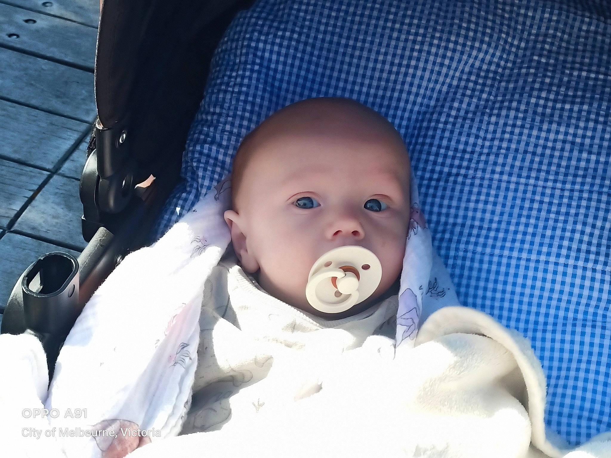 Ryder is registered to the contest to win money with this photo: baby, baby_products, baby_safety, baby_toddler_clothing, cheek, child, comfort, eye, happy, headgear, iris, linens, person, portrait_photography, sitting, skin, toddler