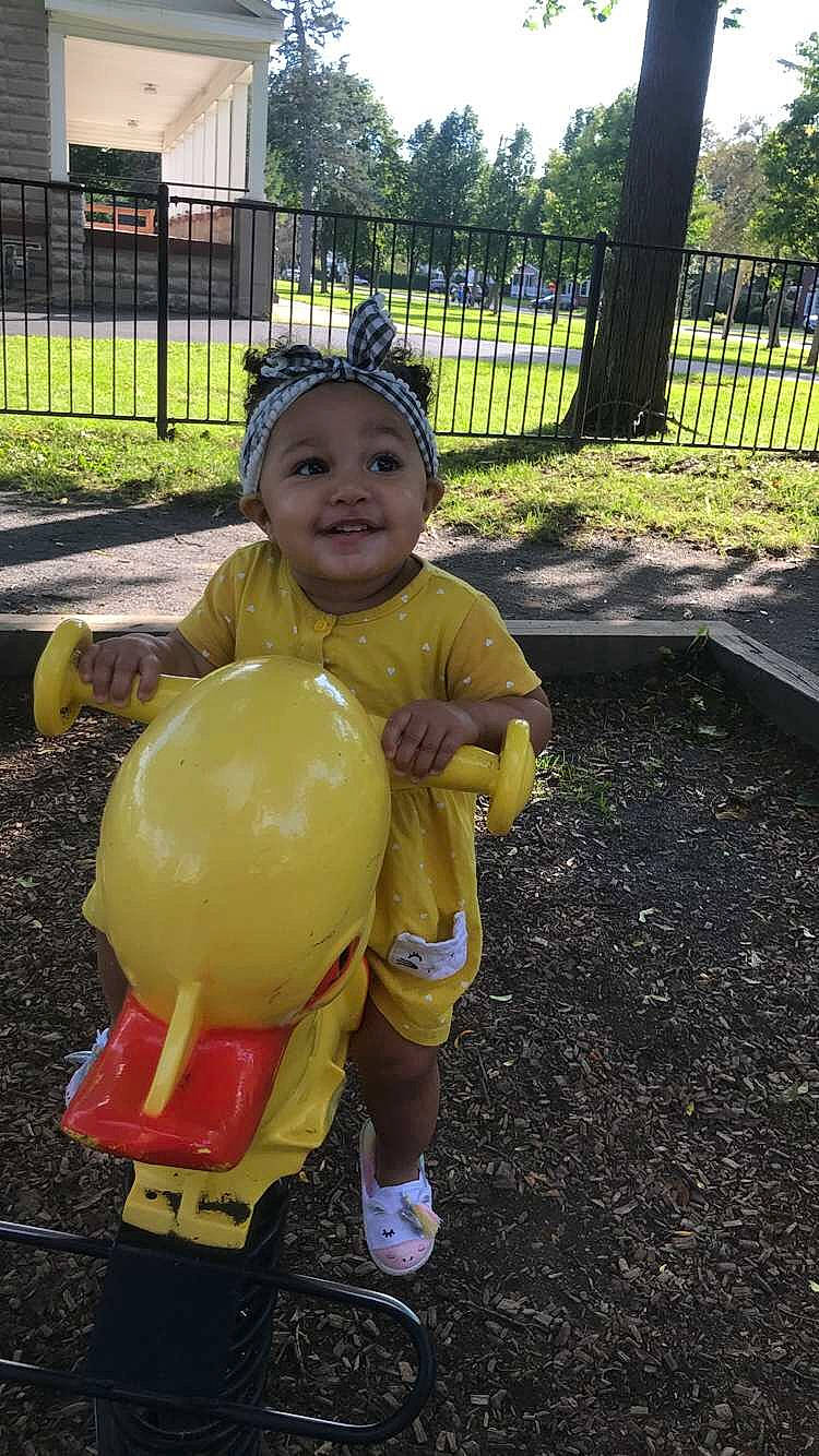Milani is registered to the contest to win money with this photo: child, fun, garden, joy, person, play, playground, smile, toddler, yellow