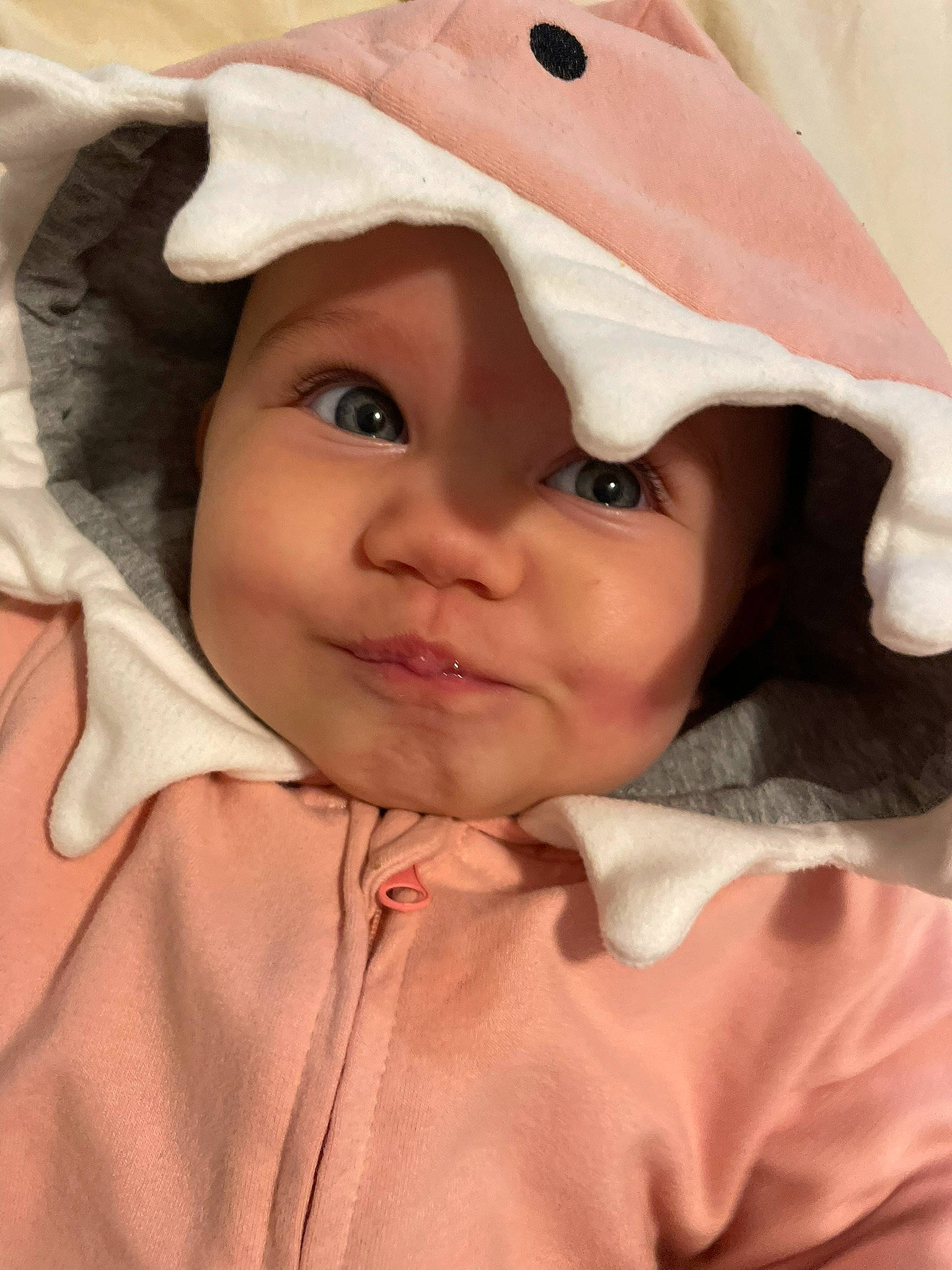 Kyah joined the competition — help win amazing prizes! baby, cap, cheek, chin, eye, eyebrow, face, gesture, happy, head, headwear, human_body, jaw, lip, mouth, nose, outerwear, person, pink, skin