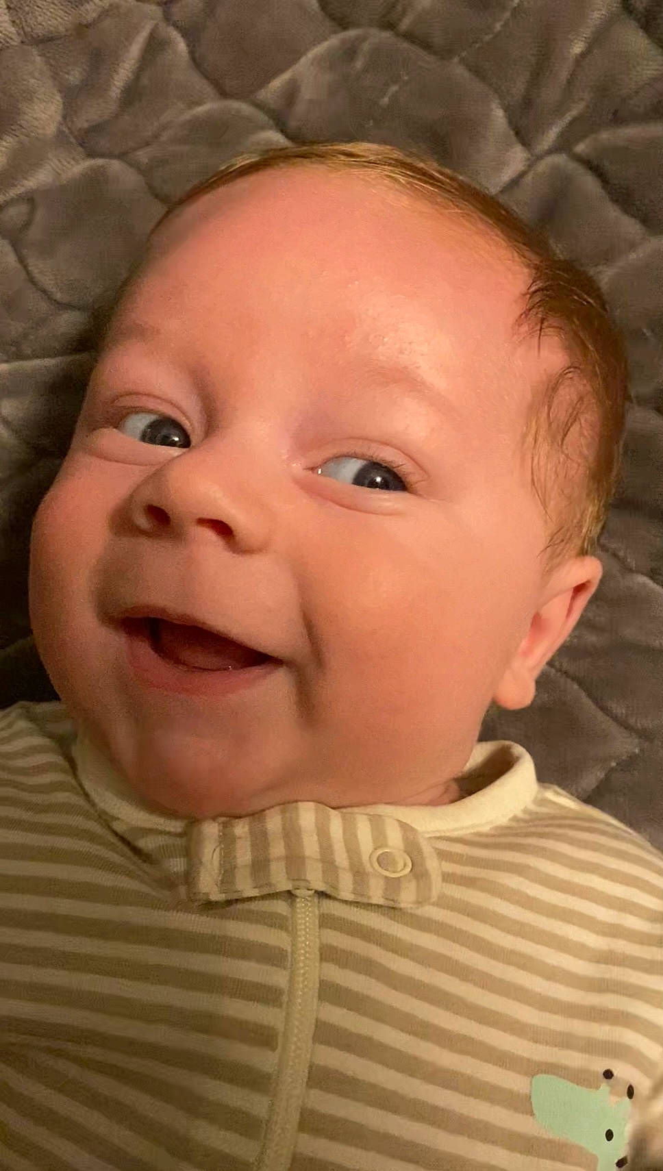 Jaxon is registered to the contest to win money with this photo: baby, baby_toddler_clothing, cheek, chin, ear, eye, eyelash, forehead, happy, iris, lip, mouth, nose, organ, person, pink, skin, sleeve, smile, textile