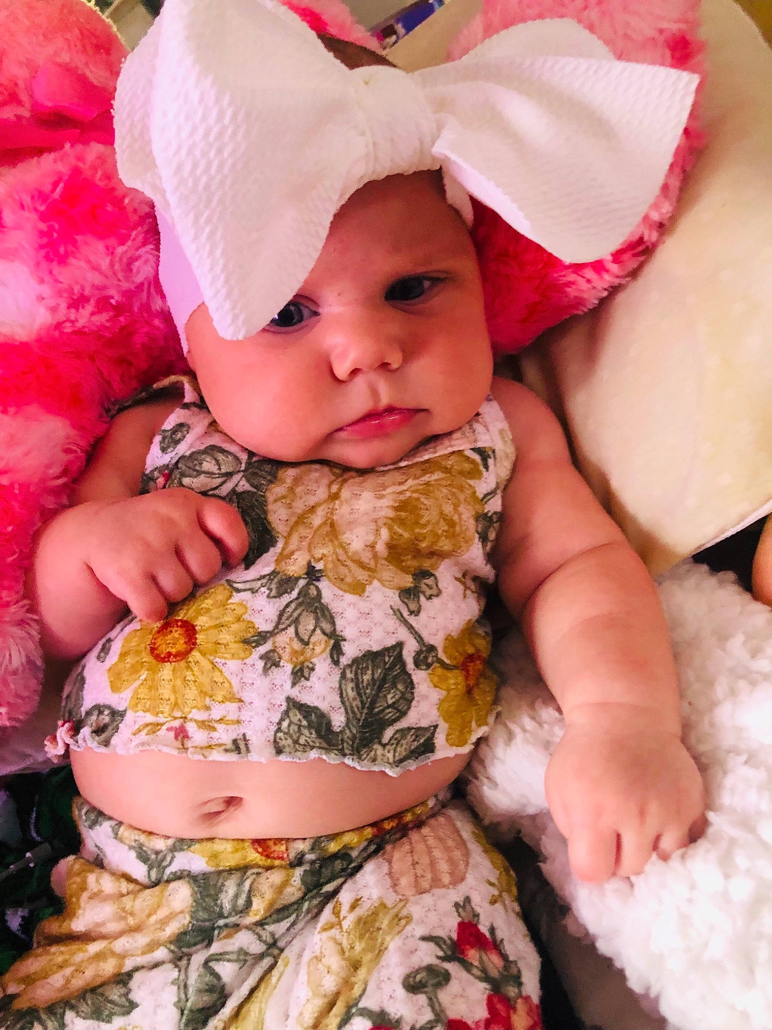Oaklynn joined the competition — help win amazing prizes! baby, baby_toddler_clothing, cheek, child, comfort, dress, eye, facial_expression, finger, happy, headwear, human_body, iris, mammal, mouth, pattern, person, pink, skin, sleeve