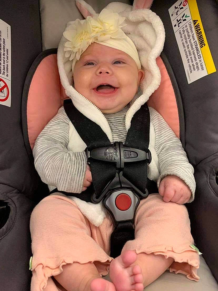 Oaklynn is registered to the contest to win money with this photo: baby, baby_toddler_clothing, car_seat, cheek, child, comfort, eye, face, facial_expression, finger, hand, happy, head, headwear, lap, person, product, service, skin, smile