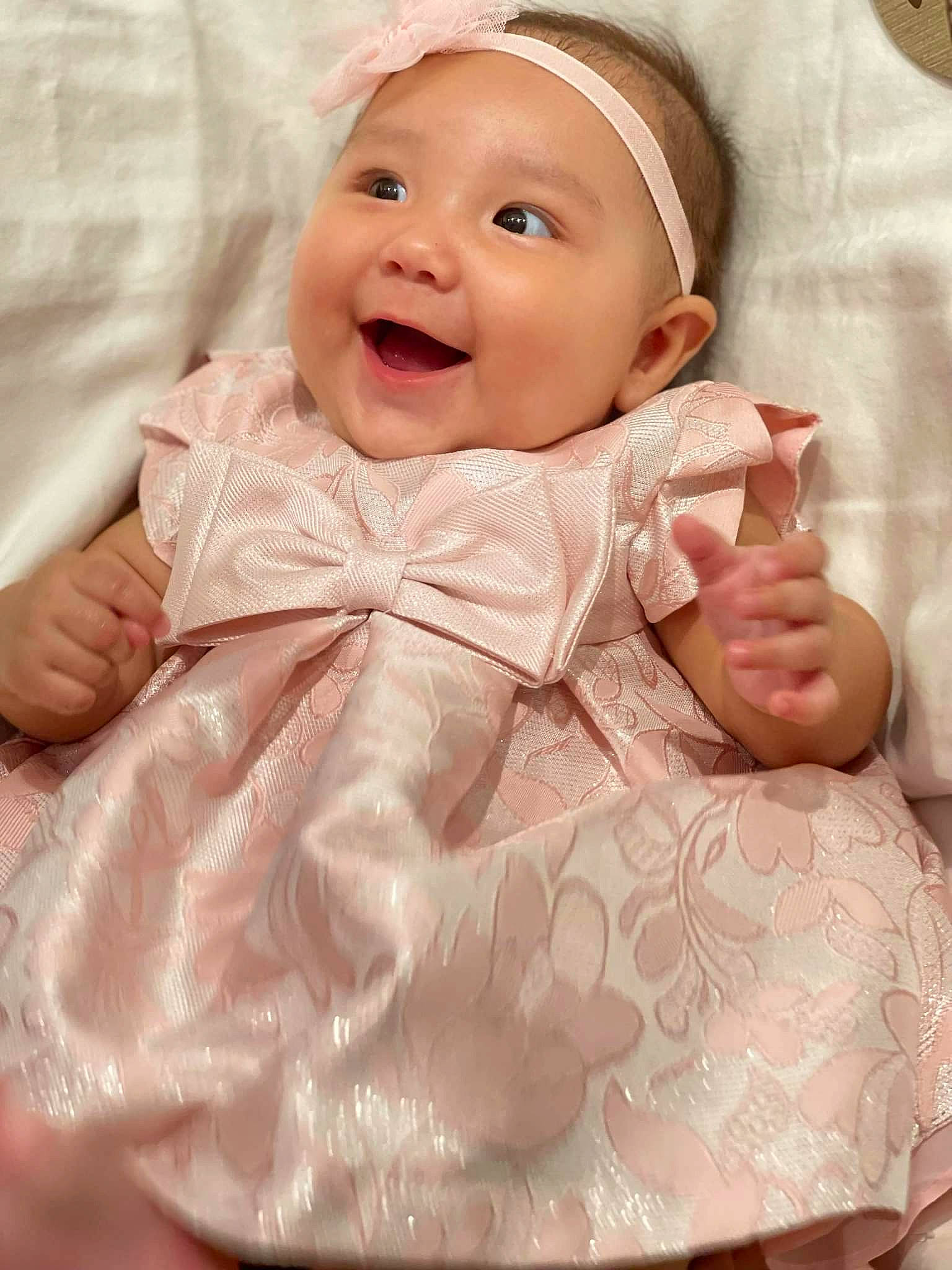 Marina is registered to the contest to win money with this photo: baby, baby_toddler_clothing, cheek, collar, comfort, eye, eyebrow, happy, head, headgear, headwear, human_body, iris, lip, nose, person, pink, skin, sleeve, smile