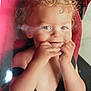 Leeroy participe au concours pour gagner de l'argent avec cette photo : baby, blonde, child, closeup, curly_hair, cute, expression, face, hands, happy, indoor, person, portrait, red, seatbelt, skin, smiling, stroller, toddler, young