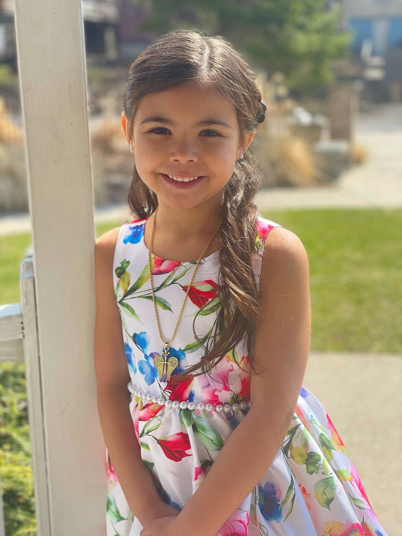 Celeste is registered to the contest to win money with this photo: black_hair, child, eye, face, facial_expression, fun, grass, happy, head, jewellery, joy, leisure, long_hair, necklace, person, plant, shoulder, skin, smile, street_fashion