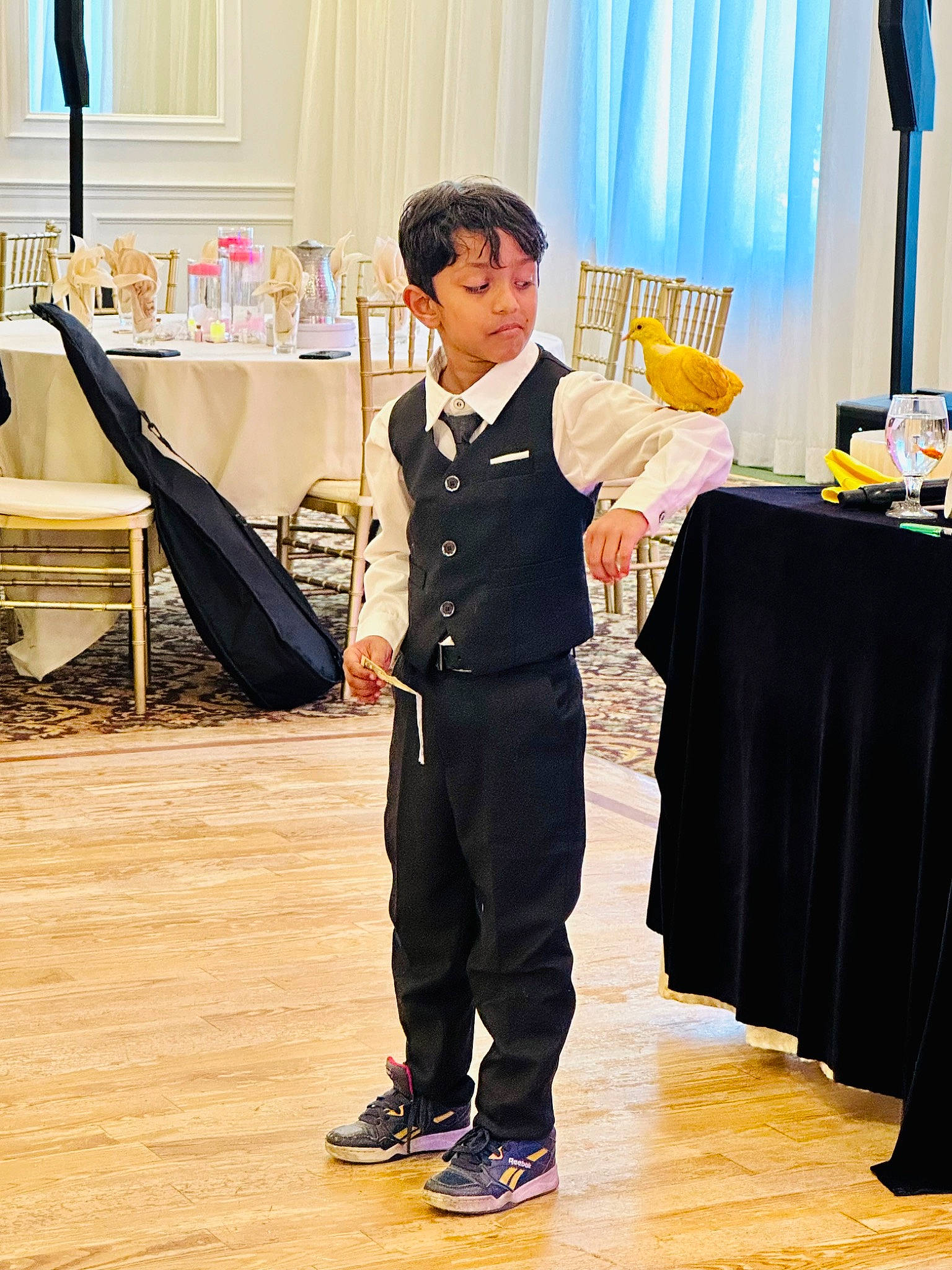 Ryan Joshy is registered to the contest to win money with this photo: bow_tie, ceremony, chair, costume, curtain, event, fashion_design, flooring, formal_wear, fun, gesture, military_uniform, official, person, room, tie, tuxedo, uniform