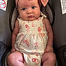 Romey joined the competition — help win amazing prizes! baby, infant, child, car_seat, headband, bow, romper, butterfly_pattern, pink, gray, face, legs, arms, skin, clothing, sitting, indoors, cute, portrait, person