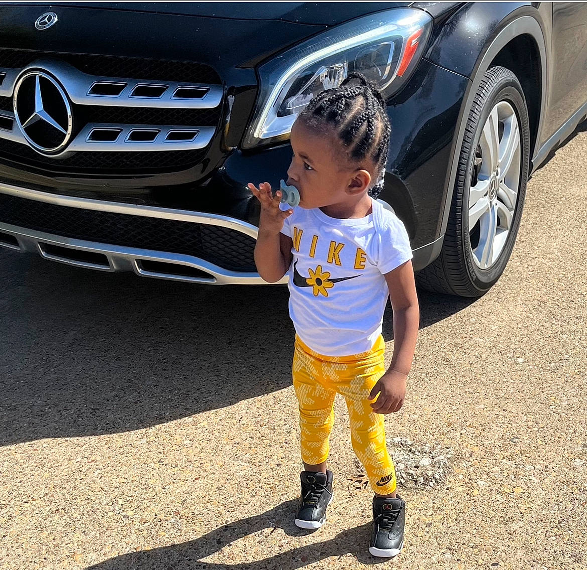 Khaleeci Davis is registered to the contest to win money with this photo: alloy_wheel, automotive_design, automotive_exterior, automotive_lighting, automotive_tire, automotive_wheel_system, bumper, car, fender, grille, headlamp, hood, land_vehicle, motor_vehicle, person, personal_luxury_car, rim, tire, vehicle, wheel