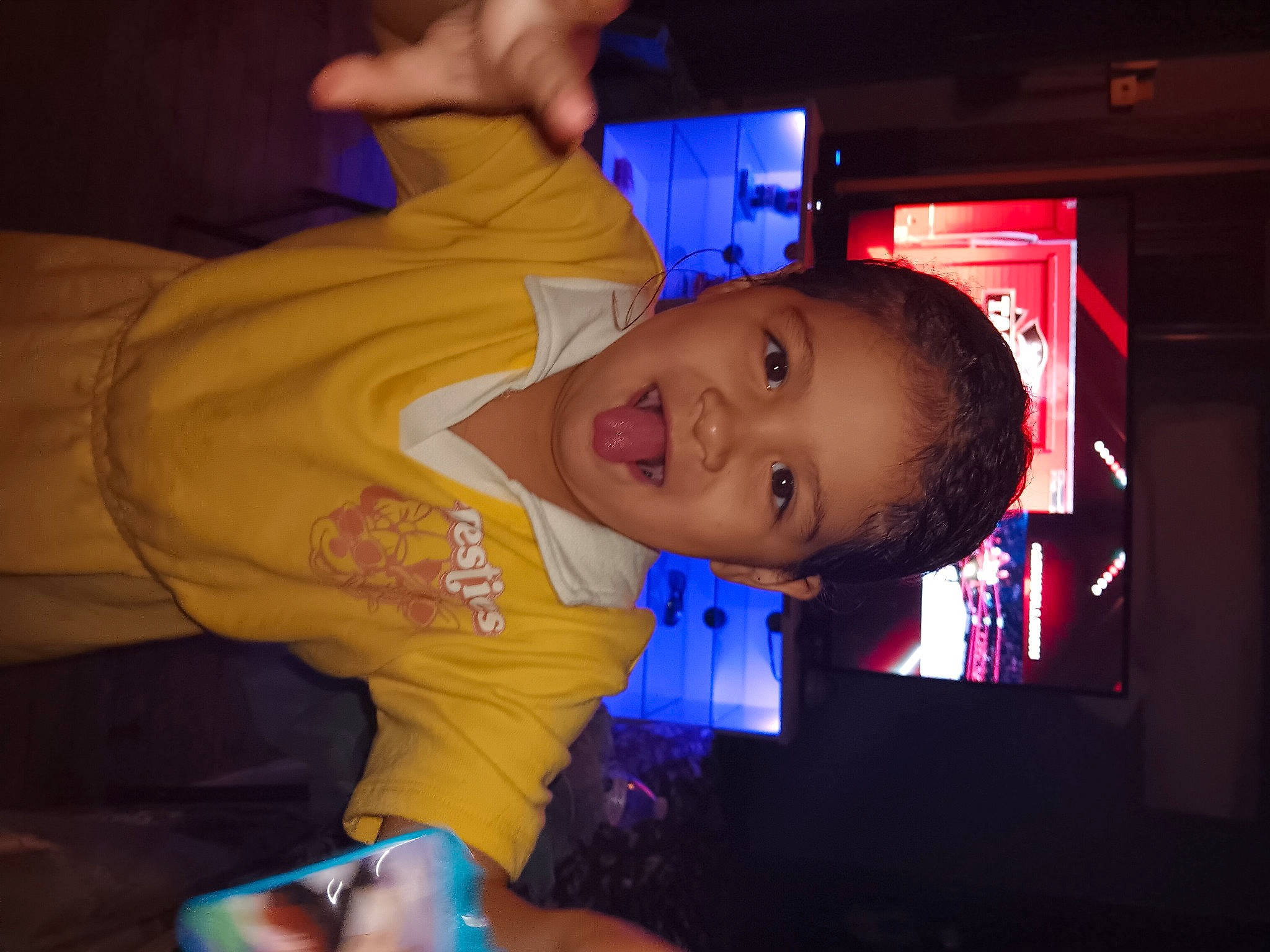 Cheyenne joined the competition — help win amazing prizes! baby_toddler_clothing, cheek, child, display_device, ear, elbow, electric_blue, event, eyebrow, finger, flash_photography, fun, nose, person, room, sleeve, smile, space, t_shirt, thumb