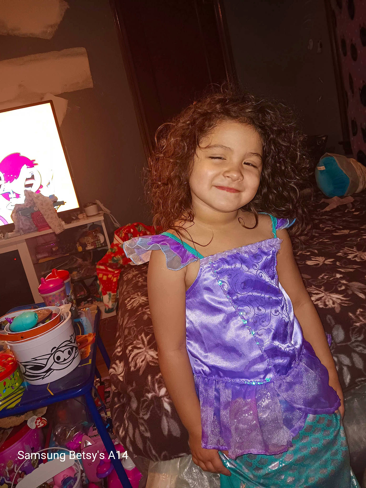 Cheyenne is registered to the contest to win money with this photo: beauty, child, electric_blue, event, fashion_design, flash_photography, formal_wear, fun, happy, joy, leisure, magenta, party, pattern, person, pink, purple, room, sitting, smile