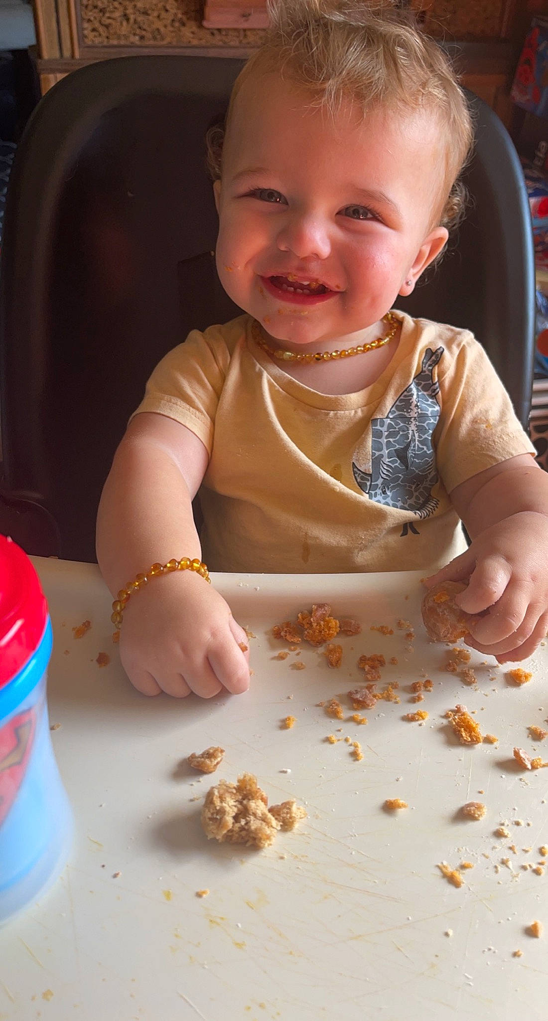 Krew is registered to the contest to win money with this photo: baby, baby_toddler_clothing, child, comfort_food, cuisine, dish, drinking_water, finger, food, food_craving, fun, hand, happy, joy, nail, person, plastic_bottle, smile, sweetness, tableware