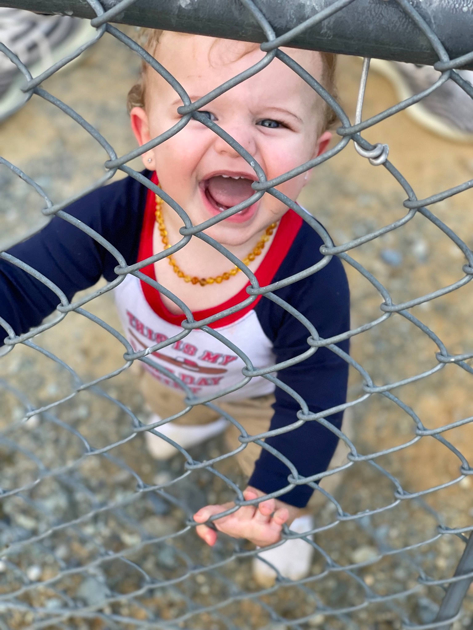 Krew joined the competition — help win amazing prizes! chain_link_fencing, child, face, fence, fun, happy, hat, headwear, leisure, mesh, net, outdoor_play_equipment, pattern, person, play, player, recreation, smile, soil, sun_hat