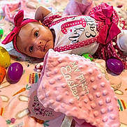 Annalyn joined the competition — help win amazing prizes! baby, balloon, birthdaycake, blanket, bonnet, cake, candy, clothing, cream, dessert, face, food, hat, head, people, person, photography, portrait, sweets, toy