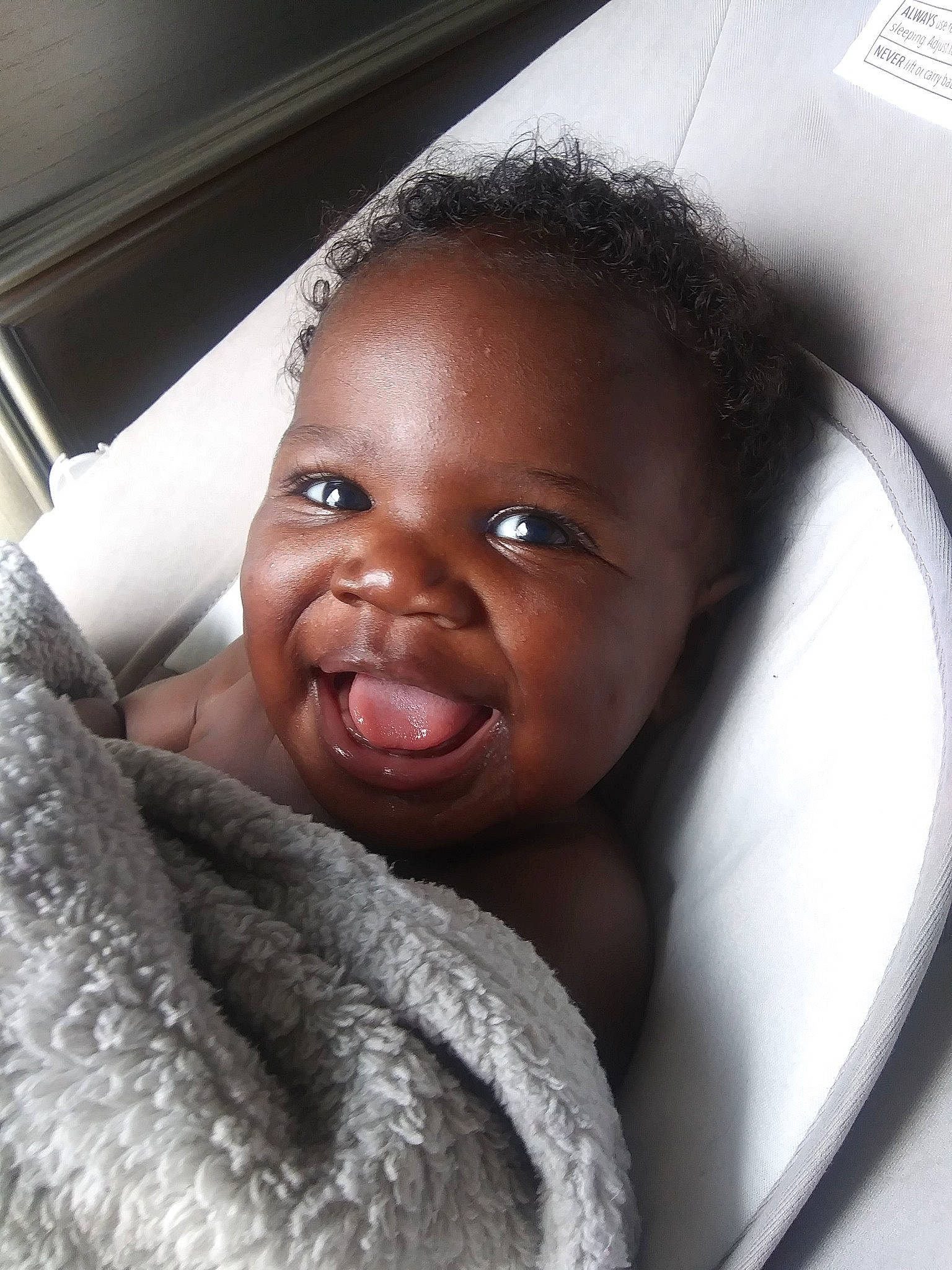 Chozen is registered to the contest to win money with this photo: baby, birth, black, black_hair, cheek, child, face, facial_expression, head, lip, nose, person, skin, smile, toddler