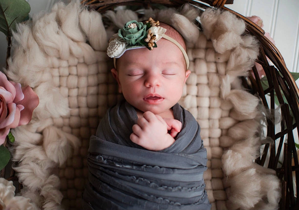 Adley joined the competition — help win amazing prizes! baby, baby_toddler_clothing, cheek, child, finger, hand, headgear, headwear, jewellery, ornament, pattern, person, petal, pink, plant, product, rose, textile, thumb, toddler