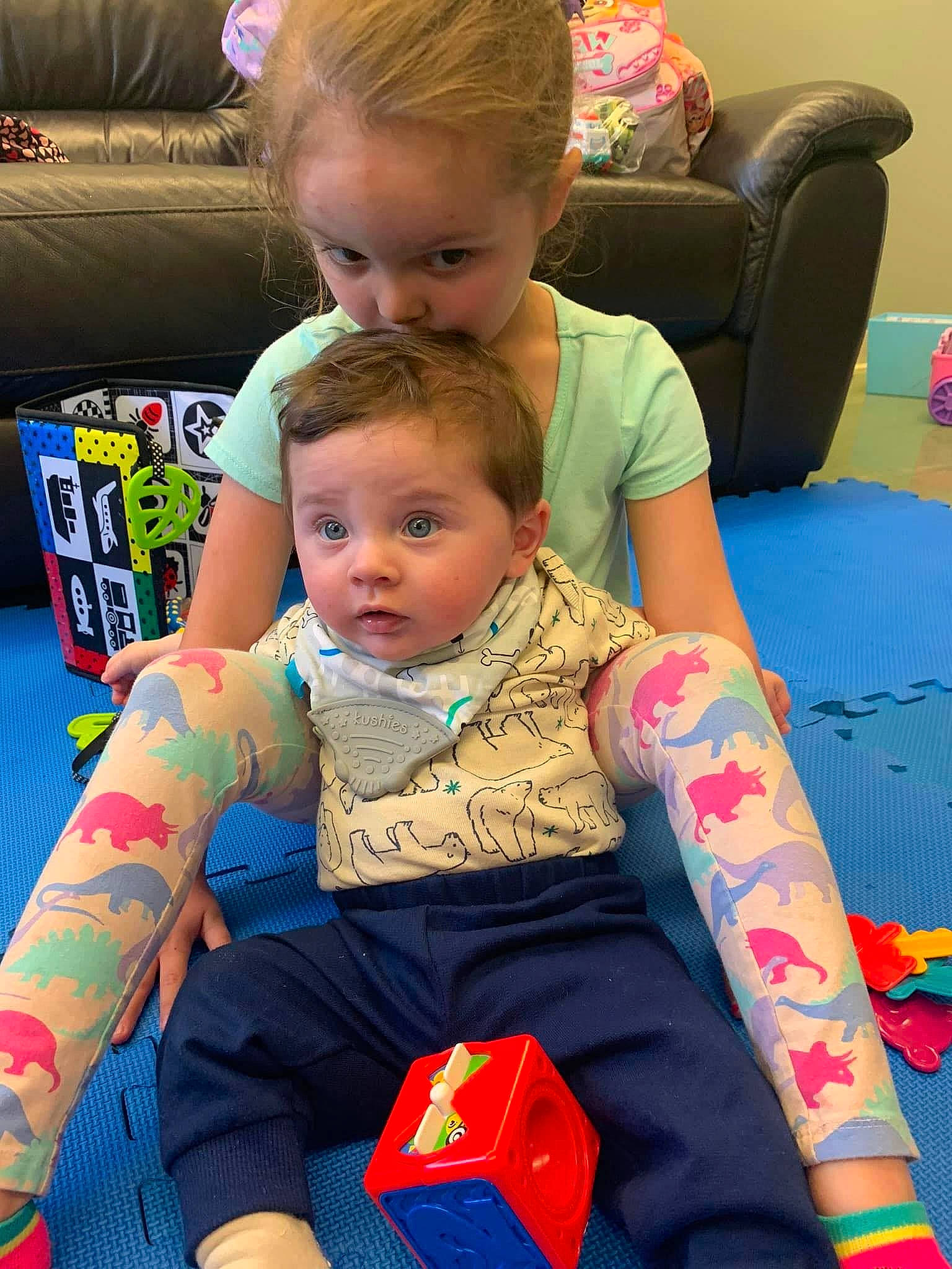 Roderick is registered to the contest to win money with this photo: baby, baby_products, box, chair, child, couch, event, flooring, fun, hairstyle, lap, leisure, pattern, person, play, recreation, room, sitting, summer, surprise