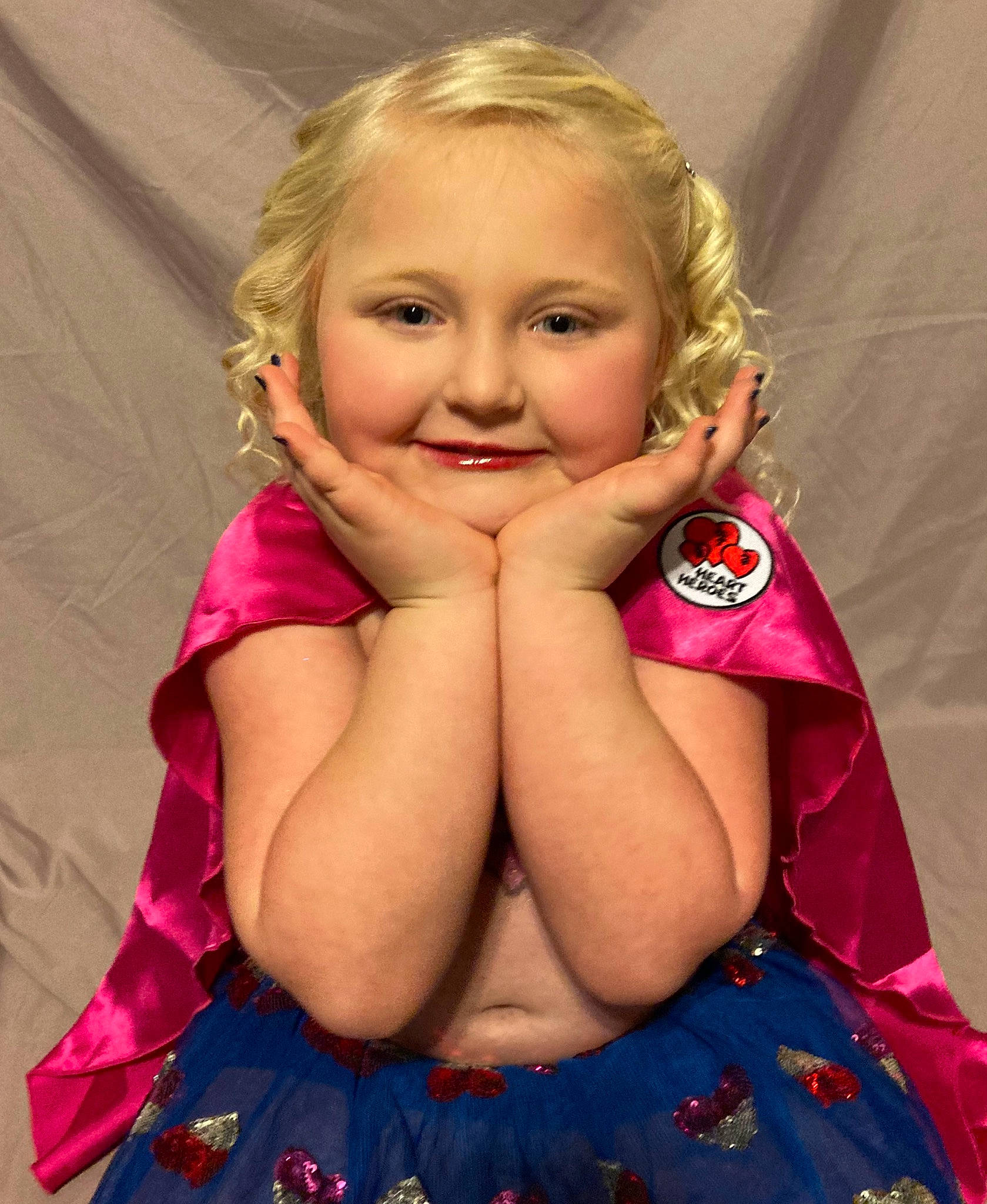 Makinzy is registered to the contest to win money with this photo: cheek, child, dress, eye, face, fun, gesture, hair, hairstyle, happy, head, joy, lip, long_hair, neck, nose, person, pink, skin, sleeve