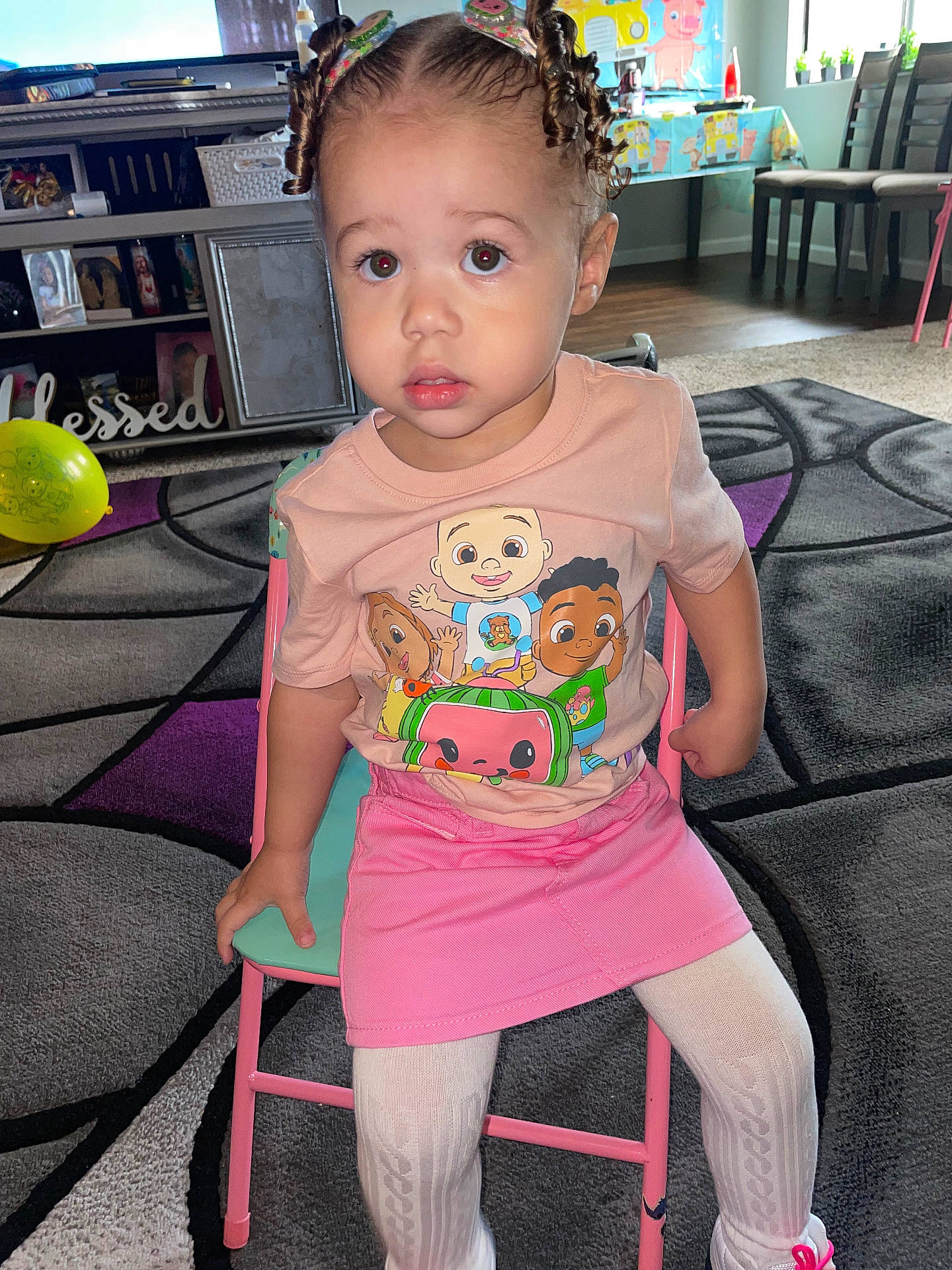 Empress is registered to the contest to win money with this photo: chair, child, clothing, couch, face, female, footwear, furniture, girl, head, homedecor, indoors, person, photography, portrait, shoe, shorts, sitting, sphere, t_shirt