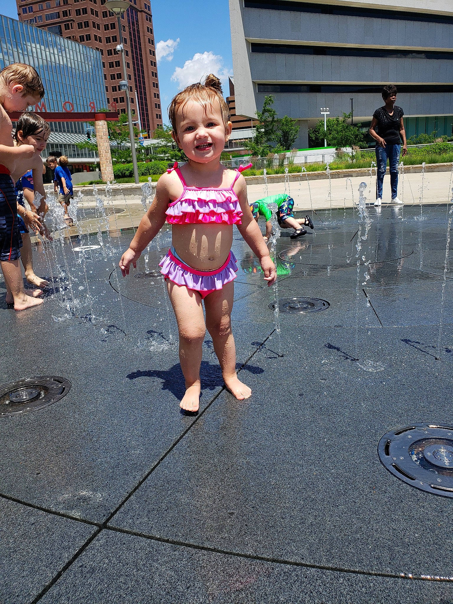 Kynslee is registered to the contest to win money with this photo: child, fountain, fun, joy, leisure, person, play, public_space, recreation, summer, toddler, vacation, water, water_feature