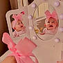 Lunden joined the competition — help win amazing prizes! baby, pink_bow, mirror, reflection, smile, headband, infant, vanity, lights, white_furniture, cute, happy, child, indoors, portrait, decor, soft_light, pink_clothing, hands, face