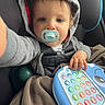 Hunter joined the competition — help win amazing prizes! baby, blue, car, car_seat, child, clothing, cute, gray, hand, hoodie, indoor, infant, pacifier, person, play, safety, seat, seatbelt, toddler, toy