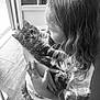 Aïko participe au concours pour gagner de l'argent avec cette photo : child, cat, kitten, holding, indoor, window, curious, affection, black_and_white, young_girl, pet, animal, floor, clothing, long_hair, cute, love, portrait, home, tender_moment